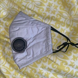Brand new light grey mask face
